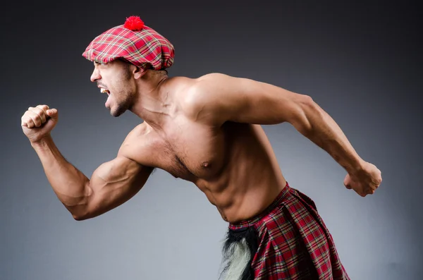 Homem vestindo roupas tradicionais escocesas — Fotografia de Stock