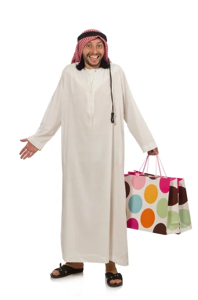 Uomo arabo con shopping bags su bianco — Foto Stock