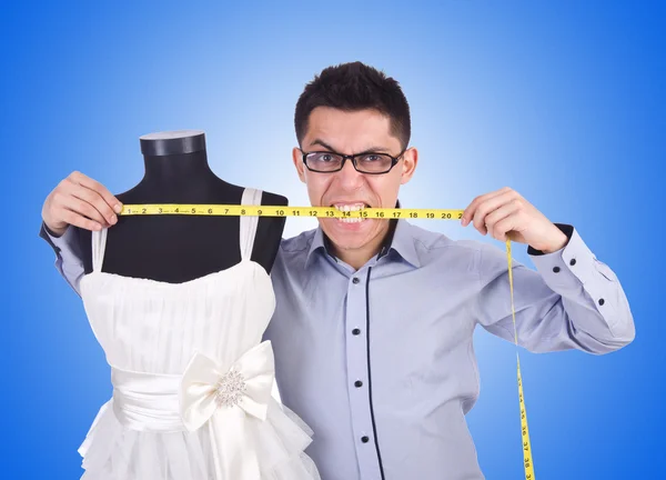 Funny male tailor against the gradient — Stock Photo, Image