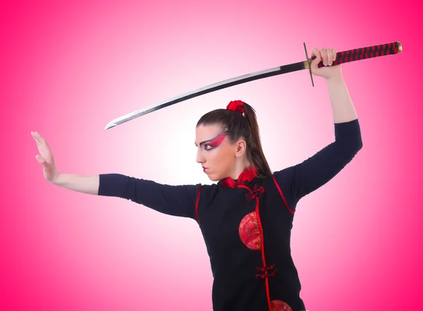 Vrouw in japans martial art concept — Stockfoto