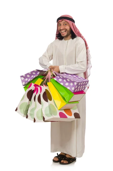 Uomo arabo con shopping bags su bianco — Foto Stock