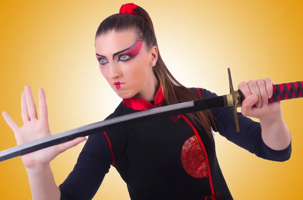 Vrouw in japans martial art concept — Stockfoto