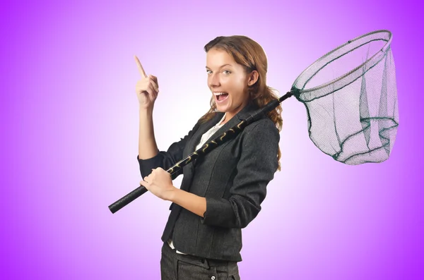 Woman with net on purple — Stock Photo, Image