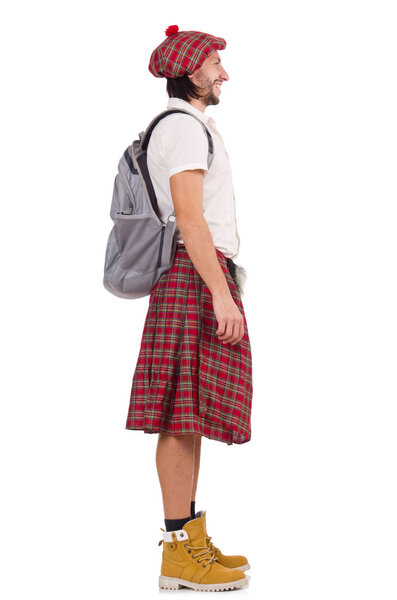 Man in scottish skirt on white