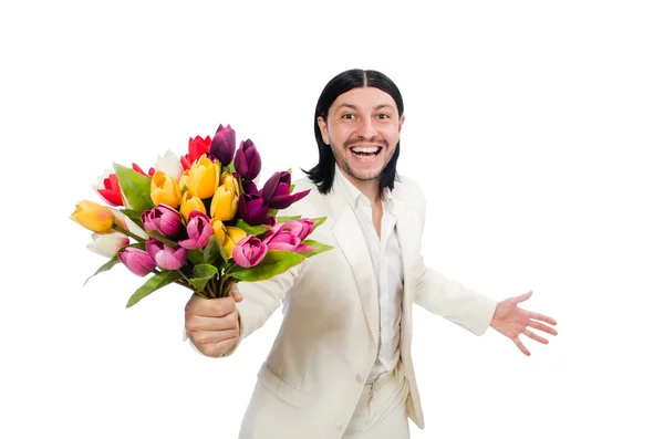 Uomo con fiori di tulipano — Foto Stock