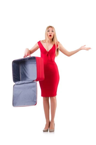 Frau in rotem Kleid und Reisetasche — Stockfoto