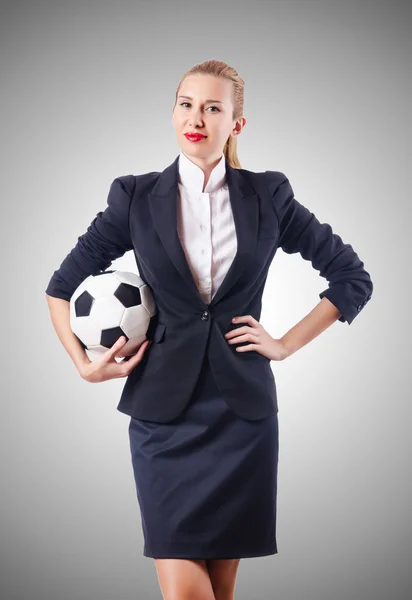 Businesswoman with football — Stock Photo, Image