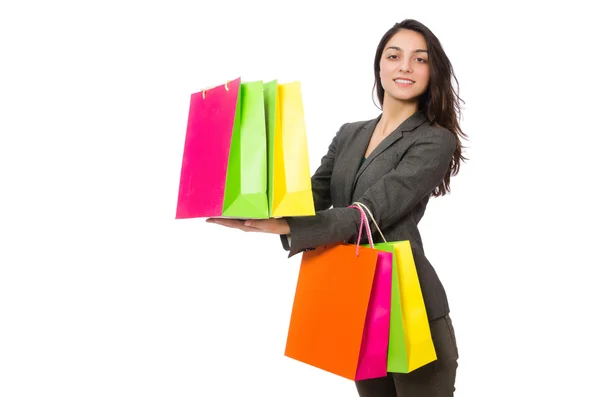 Mulher atraente com sacos de compras isolados em branco — Fotografia de Stock