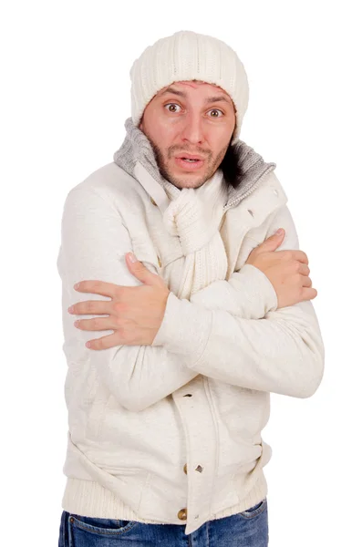 Jonge man in winterkleren geïsoleerd op wit — Stockfoto