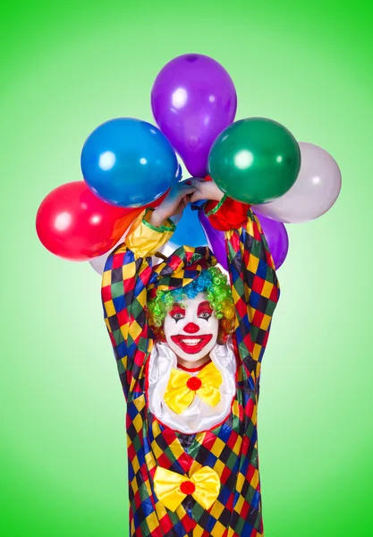 Zabawny clown na białym tle na zielono — Zdjęcie stockowe