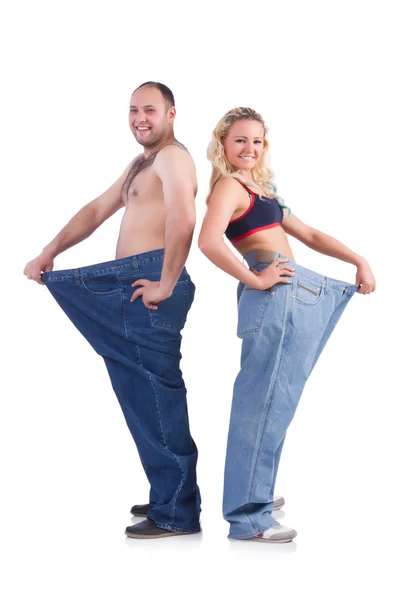 Woman and man loosing weight isolated on white — Stock Photo, Image