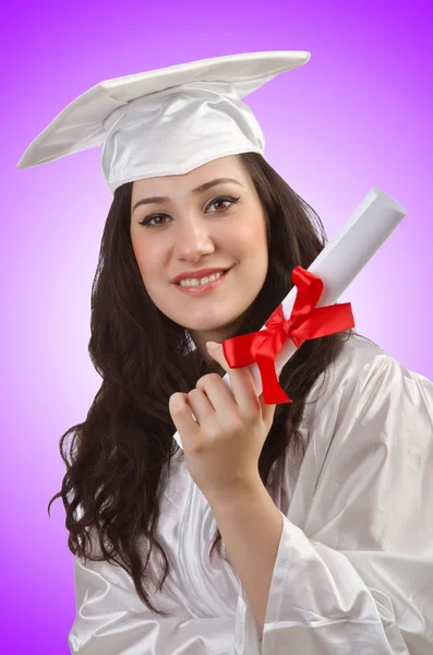 Feliz graduado contra el gradiente — Foto de Stock