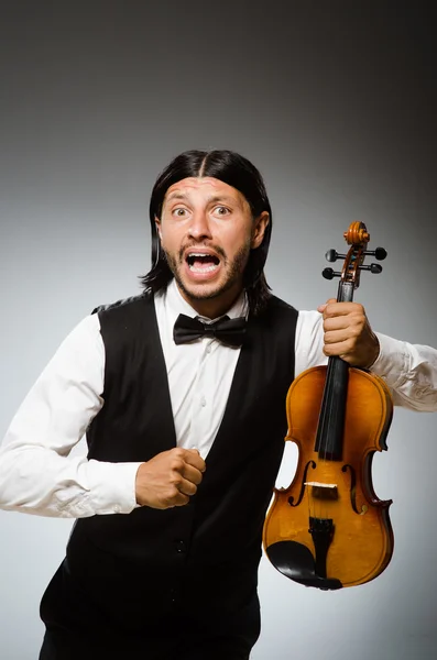 Homem tocando violino no conceito musical — Fotografia de Stock