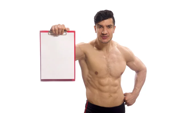 Muskulöser Mann mit leerem Pad für Ihre Botschaft — Stockfoto