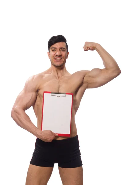 Homem muscular com almofada em branco para a sua mensagem — Fotografia de Stock