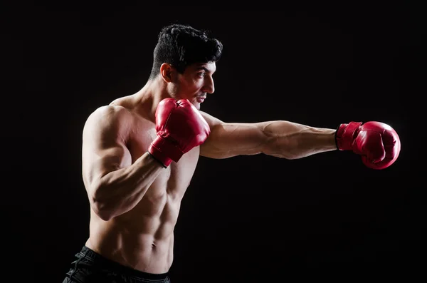 Homem muscular no conceito de boxe — Fotografia de Stock