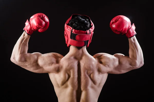 Homem muscular no conceito de boxe — Fotografia de Stock