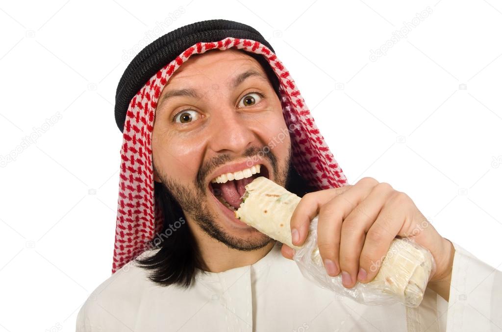 Arab man eating isolated on white