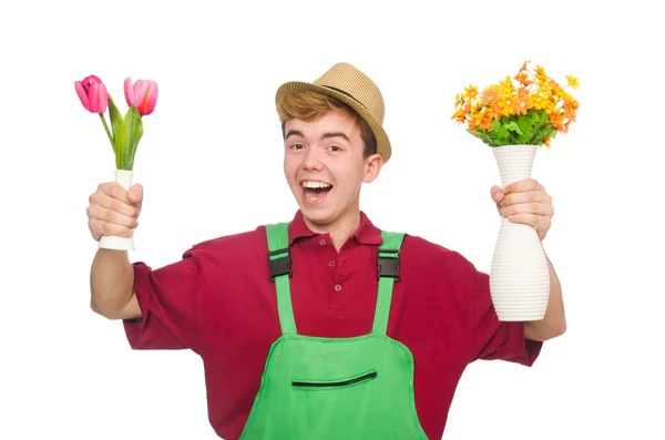 Jovem jardineiro com flores — Fotografia de Stock