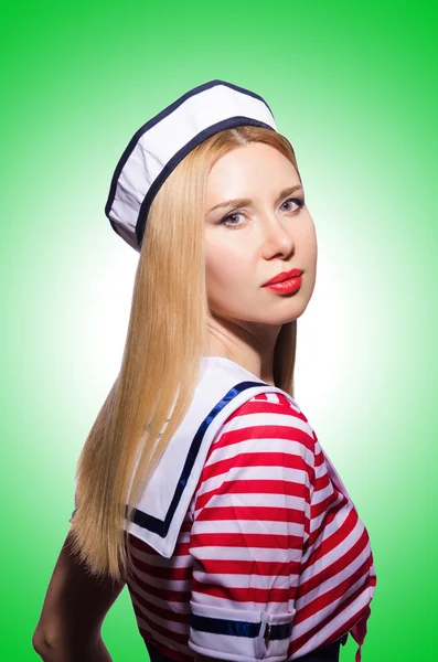 Vrouw in sailor kostuum — Stockfoto