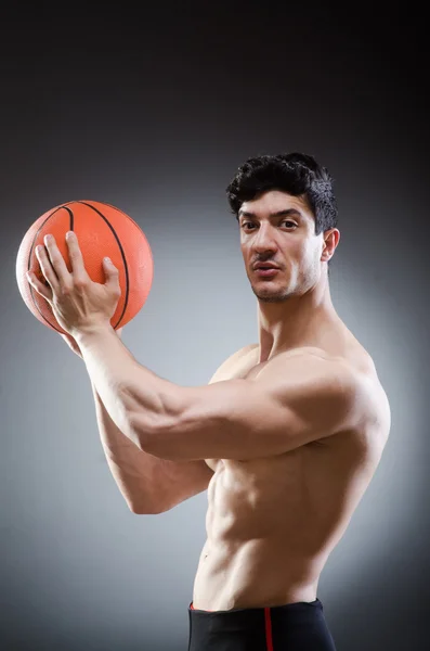 Basket-ball musculaire dans le sport concept — Photo