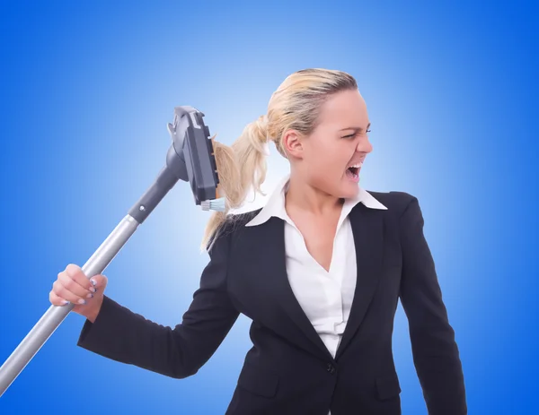 Businesswoman with vacuum cleaner — Stock Photo, Image