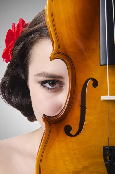 Young girl with violin on grey — Stock Photo, Image