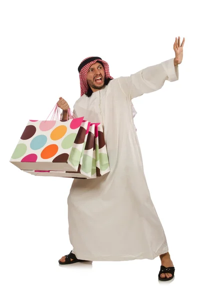 Arabe homme avec des sacs à provisions sur blanc — Photo