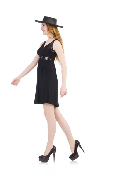 Vrouw in zwarte jurk en hoed geïsoleerd op wit — Stockfoto