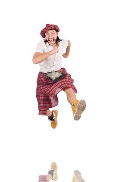 Чоловік в шотландській спідниці ізольований на білому — стокове фото