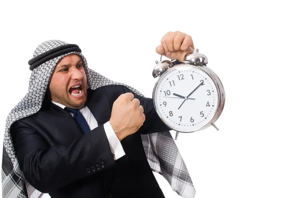 Homme arabe avec horloge isolé sur blanc — Photo