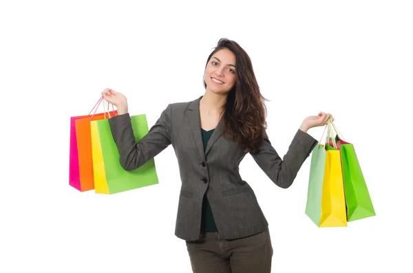 Attraktiv kvinna med shoppingväskor isolerade på vit — Stockfoto