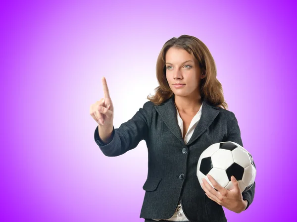 Businesswoman with football on white — Stock Photo, Image