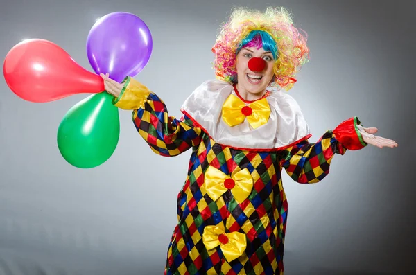 Clown with balloons in funny concept — Stock Photo, Image