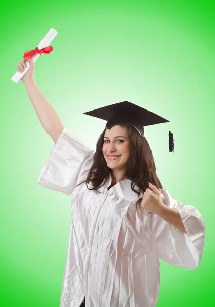 Graduate with diploma on white — Stock Photo, Image