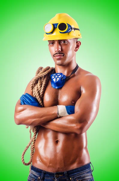 Constructor muscular con herramientas aisladas en blanco — Foto de Stock