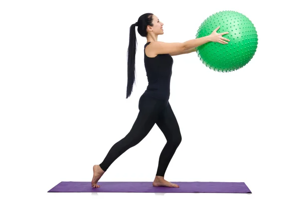 Young woman exercising with swiss ball — Stock Photo, Image