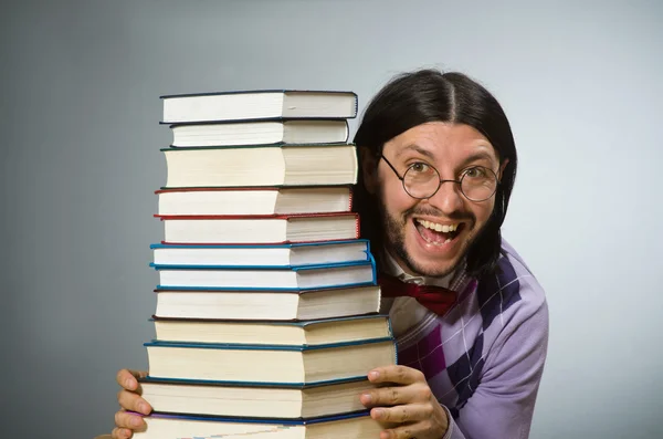 Jovem estudante com livros — Fotografia de Stock