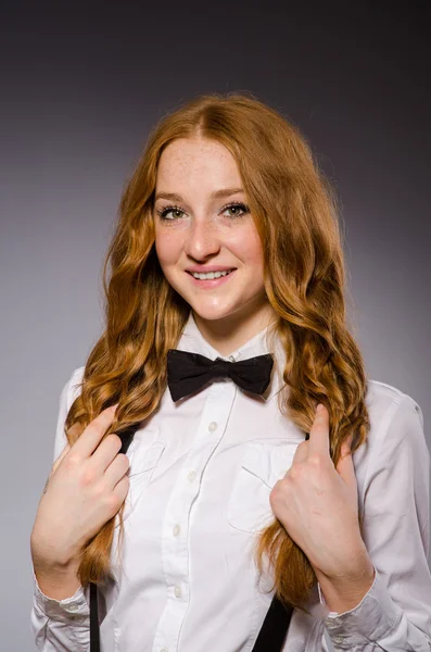 Red hair girl in classic style against gray — Stock Photo, Image