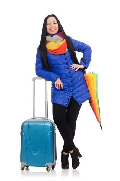 Красивая девушка с чемоданом и зонтиком изолированы на белом — стоковое фото