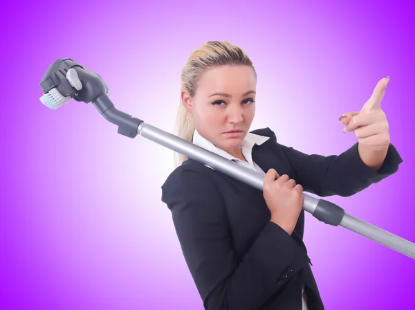 Businesswoman with vacuum cleaner — Stock Photo, Image