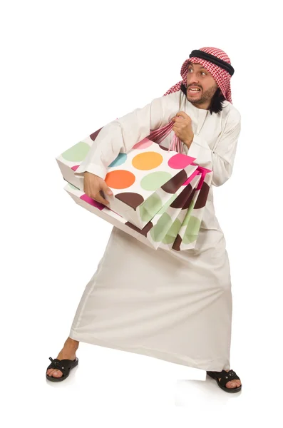 Arab muž s nákupní tašky na bílém pozadí — Stock fotografie