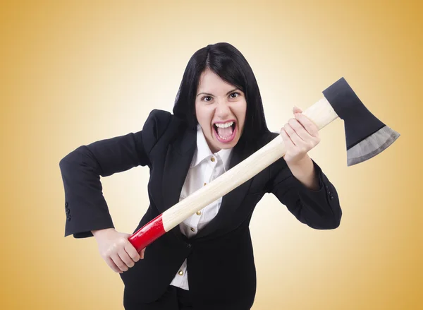 Angry businesswoman with axe — Stock Photo, Image