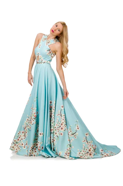 흰색 꽃 자국이나 있는 파란 긴 드레스를 입고 있는 여자 — 스톡 사진