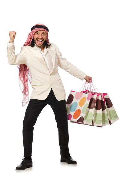 Hombre árabe con bolsas de compras en blanco —  Fotos de Stock