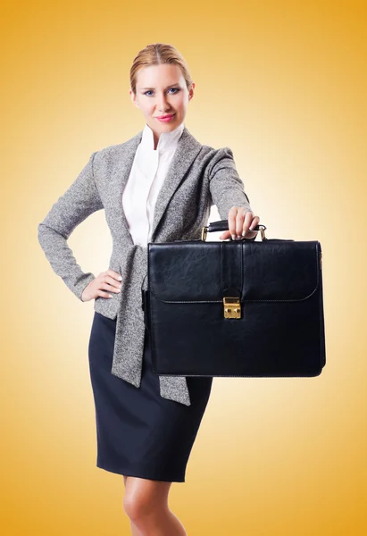 Attractive businesswoman isolated on yellow — Stock Photo, Image