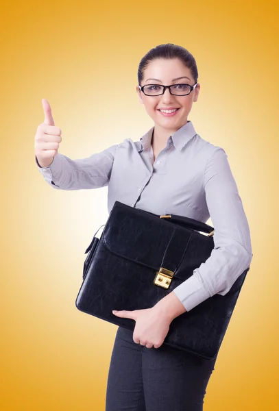 Young businesswoman isolated on yellow — Stock Photo, Image