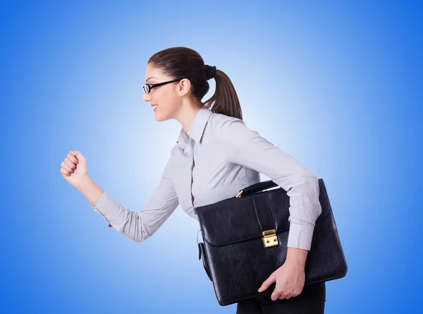 Young businesswoman isolated on blue — Stock Photo, Image