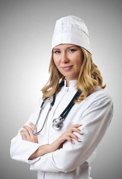 Женщина-врач изолирована на белом Лицензионные Стоковые Фото