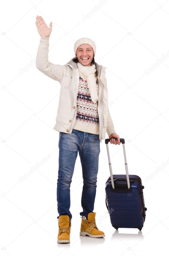 Tourist holding suitcase isolated on white